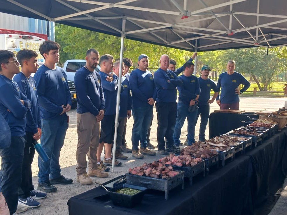 Grilling for the whole crew at an E. Costa Plumbing & Gas shop barbecue